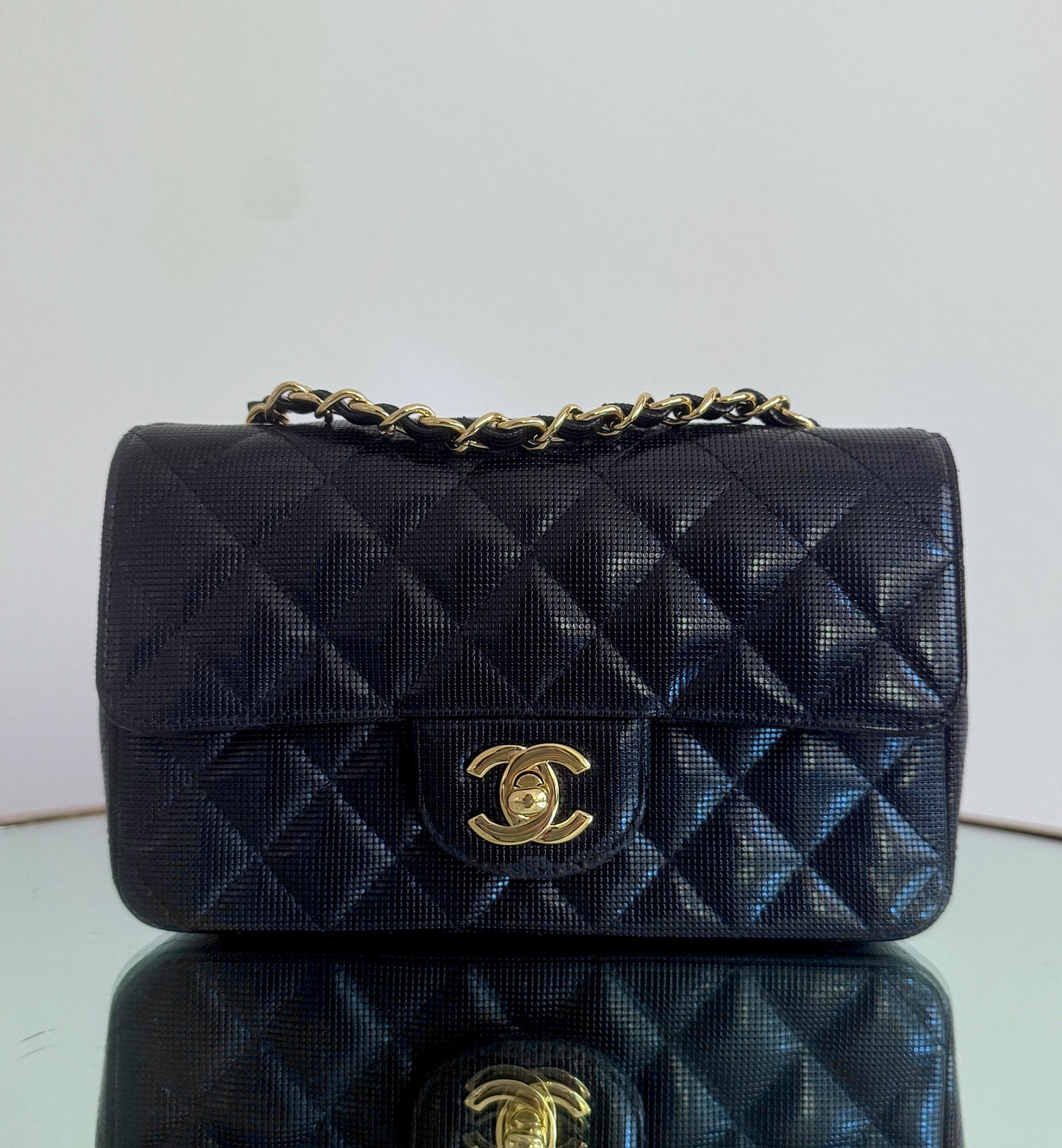Chanel Black Pixelated Quilted Mini Flap Gold Hardware